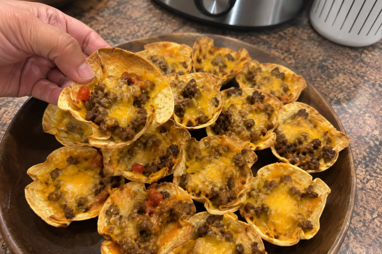 Crispy 3-ingredient taco bite appetizers on a wooden platter at a summer backyard BBQ